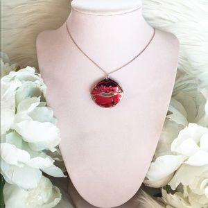 Hello Drama Lucite Silver Pierced Lips Necklace